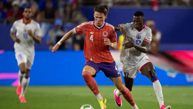 Danley JEAN JACQUES of Haiti and Scott McTominay of Scotland (4) during the FIFA World Cup 2026 Group C match between Haiti and Scotland at Boston Stadium on June 13, 2026 in Foxborough, United States