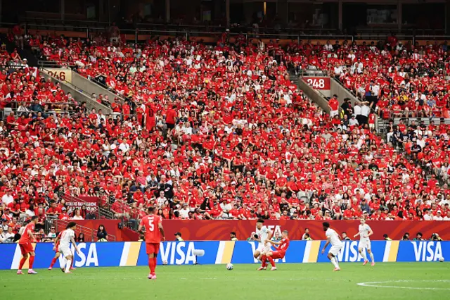 Spectators watch the action