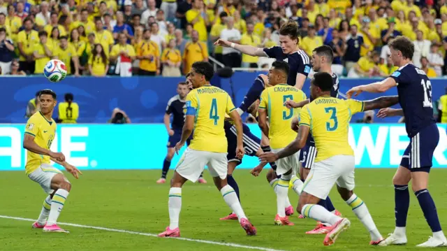Scott McTominay has a header for Scotland v Brazil