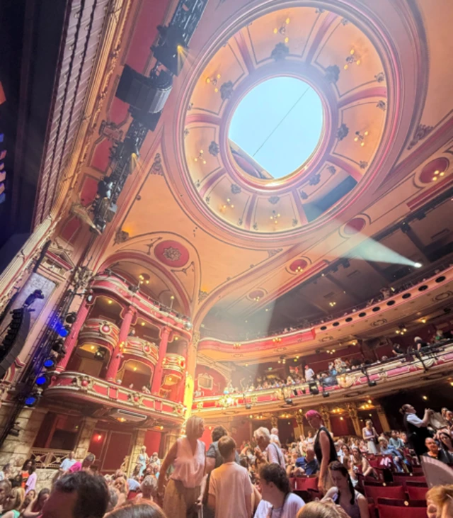 Bright sunlight shone down onto the audience below as the roof was slowly opened for ventilation in Bristol Hippodrome