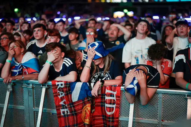 Scotland fans react as they watch the Scotland v Brazil