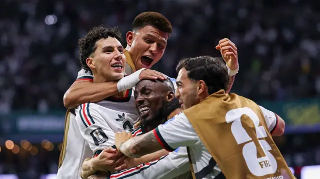 Julian Quinones of Mexico celebrates with teammates after scoring his team's second goal during the FIFA World Cup 2026 Group A match between Czechia and Mexico.