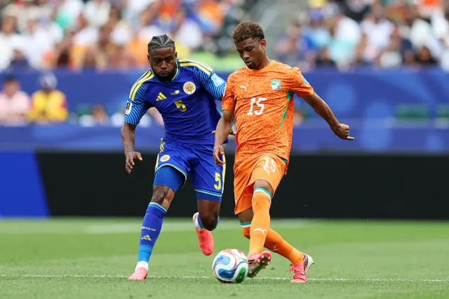 Amad Diallo #15 of Cote d'Ivoire controls the ball