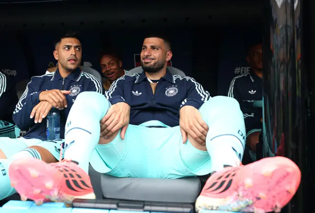 Nadiem Amiri #20, Assan Ouedraogo #25 and Deniz Undav #26 of Germany react