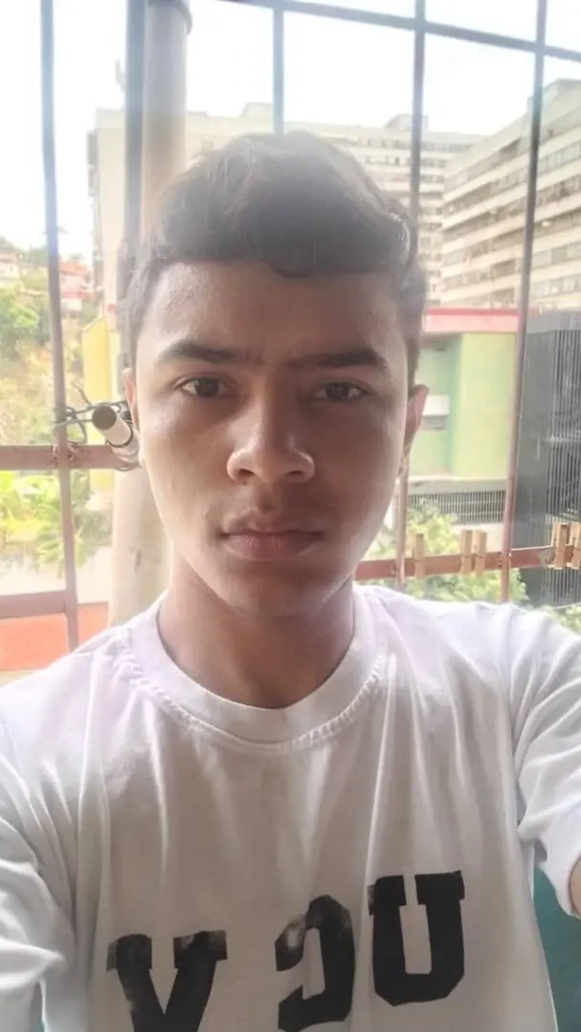 Antoan Marín wearing white t-shirt