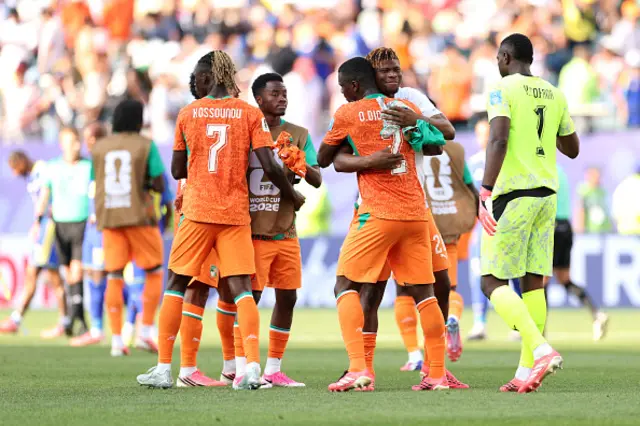 Players of Cote d'Ivoire celebrate the team's 2-0 victory