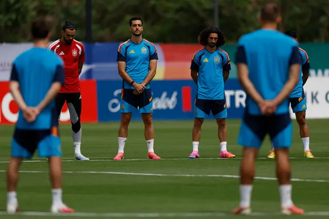 Spain's players hold a minute of silence for the victims of the earthquake in Venezuela during an MD-1 training session at Sports Arena