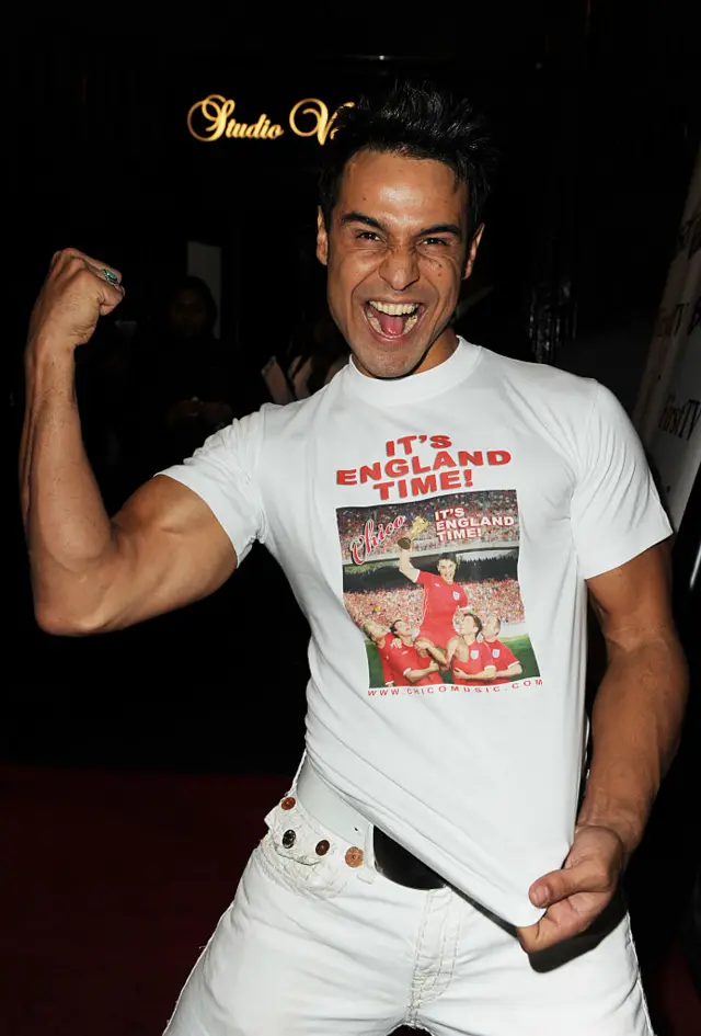 Chico Slimani in a white t-shirt.