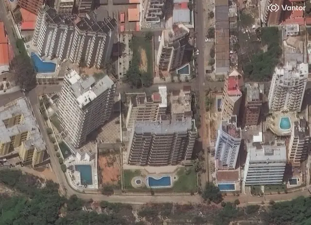 Vantor satellite image shows apartment buildings in Playa Grande, La Guaira, before earthquake damage.