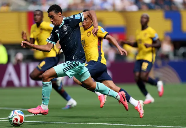 Jamal Musiala #10 of Germany controls the ball