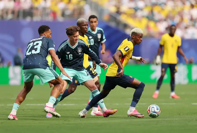Nilson Angulo #20 of Ecuador controls the ball under pressure