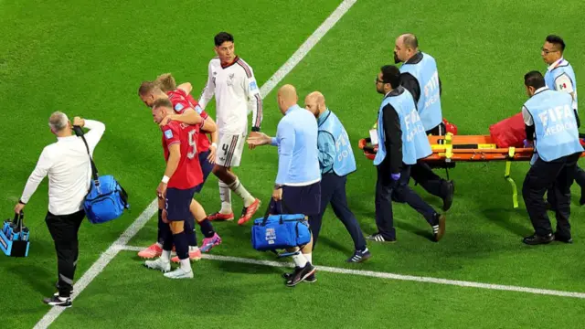 Tomas Soucek of Czechia is helped from the pitch by Vladimir Coufal of Czechia after sustaining an injury during the FIFA World Cup 2026 Group A match between Czechia and Mexico.