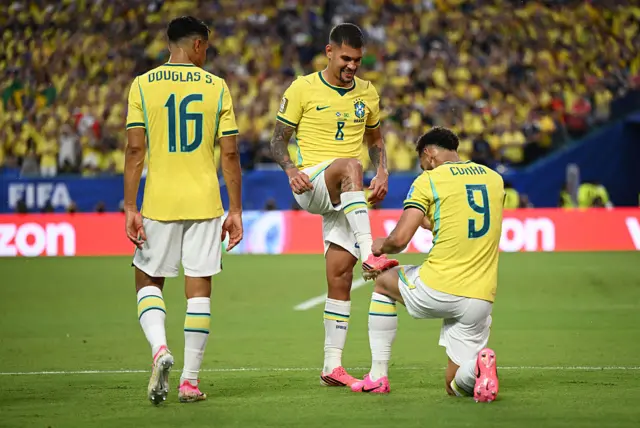 Matheus Cunha of Brazil celebrates with Bruno Guimaraes