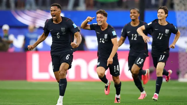 Auston Trusty of the United States celebrates with teammates after scoring his team's first goal during the FIFA World Cup 2026 Group D match between Türkiye and USA.