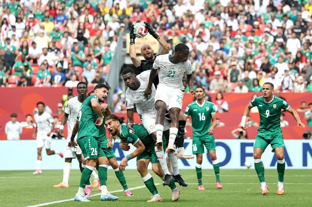 Ahmed Basil #22 of Iraq catches the ball