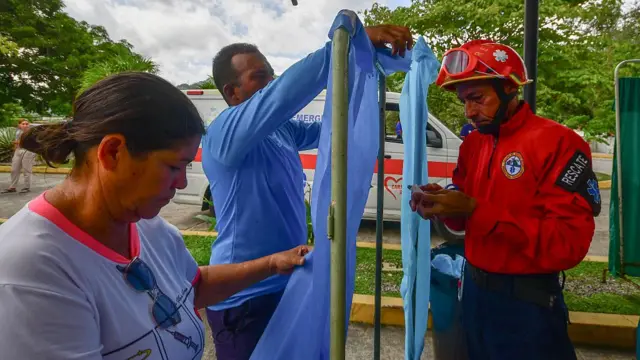 Care and rescue workers at a makeshift centre in Moron, Carabobo State on June 26, 2026.