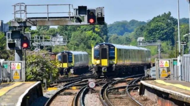 Trains on tracks near a station
