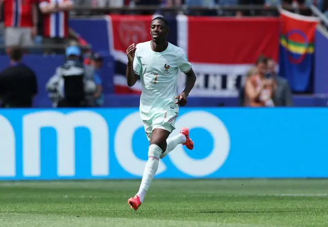 Ousmane Dembele #7 of France celebrates scoring his team's second goal