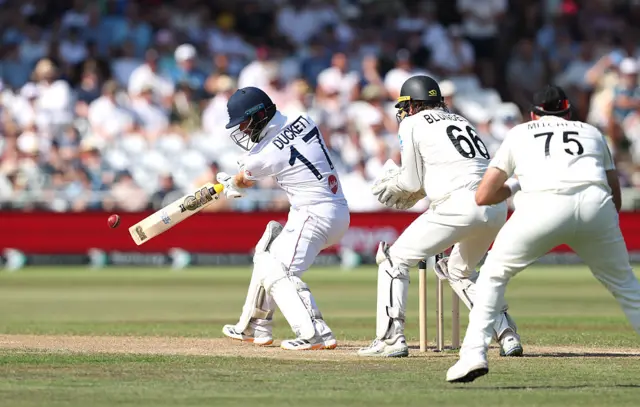 Ben Duckett nicks the ball past Daryl Mitchell