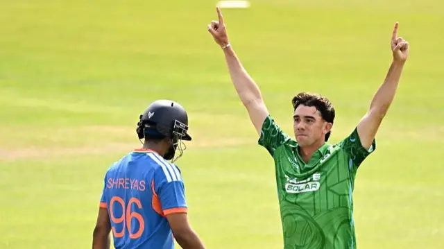 Ireland bowler Matthew Hollard celebrates after taking the wicket of India batter Shreyas Iyer,