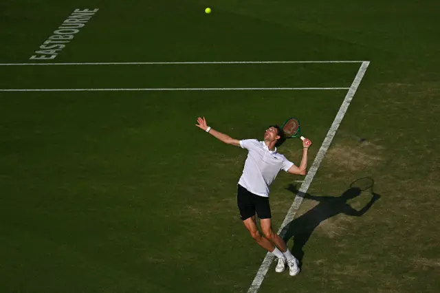 Ugo Humbert serves