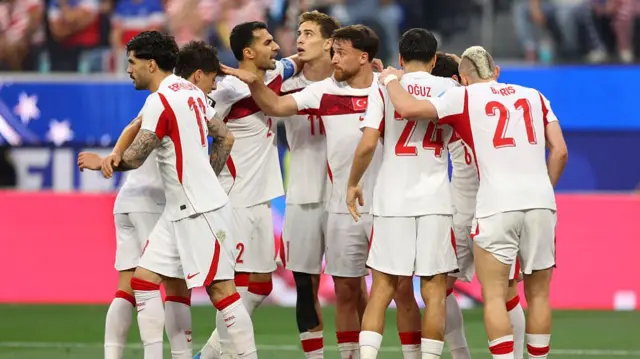 INGLEWOOrkun Kokcu #6 of Turkiye celebrates with teammates after scoring his team's second goal during the FIFA World Cup 2026 Group D match between Türkiye and USA.