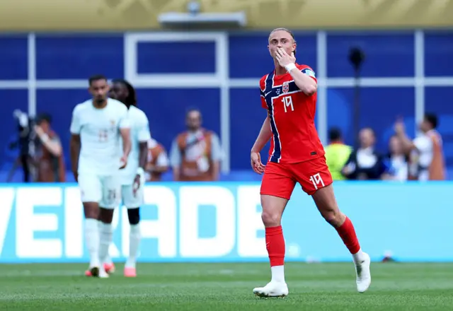 Thelo Aasgaard #19 of Norway celebrates