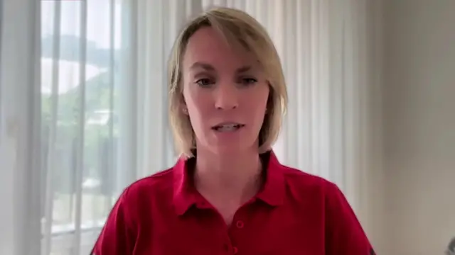 Nicola Puchelt from the IRO,wearing a dark red polo shirt
