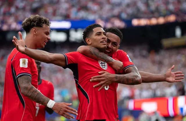Jude Bellingham of England celebrates scoring his team's first goal