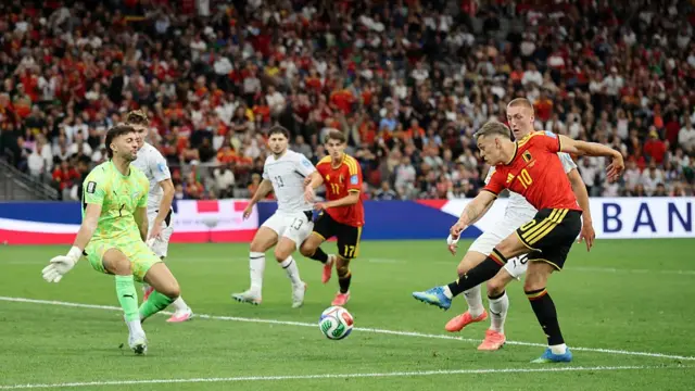 Leandro Trossard shoots at goal