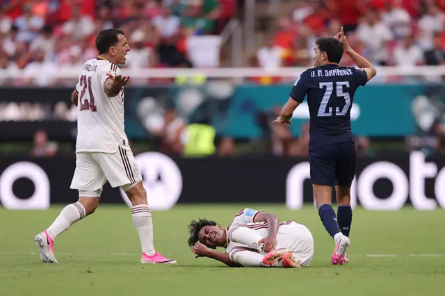 Lamine Yamal #19 of Spain reacts after fouled by Juan Manuel Sanabria