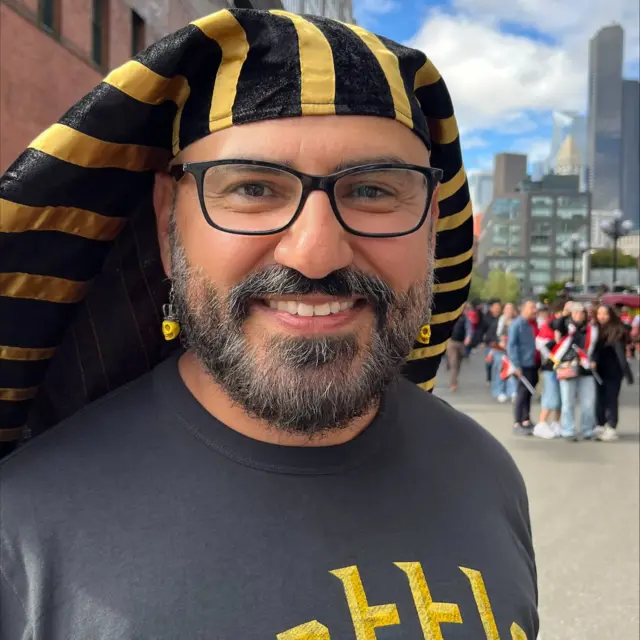 An Egypt fan wearing a Pharaoh hat