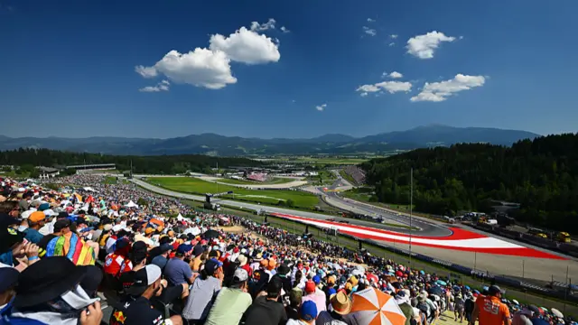 The crowd watching the track action in Austria