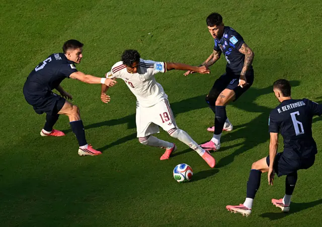 Uruguay's midfielder #05 Manuel Ugarte, Spain's forward #19 Lamine Yamal, Uruguay's defender #16 Mathias Olivera and Uruguay's defender #16 Mathias Olivera fight for the ball