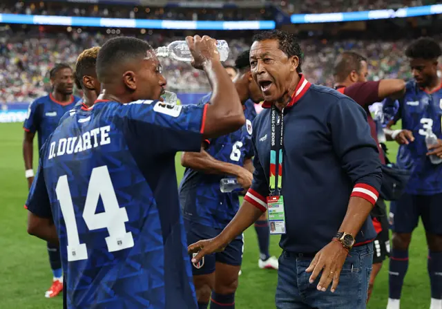 Bubista, Head Coach of Cabo Verde, speaks with Deroy Duarte