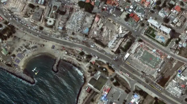 A satellite image shows collapsed structures in Caraballeda, Venezuela, following the earthquakes that hit the country