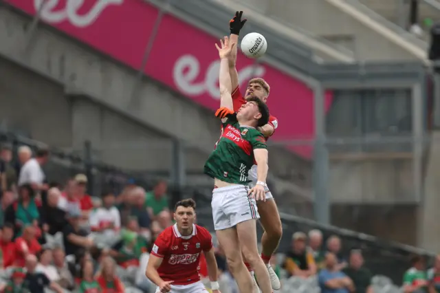 Cork's lan Maguire and Bob Tuohy of Mayo