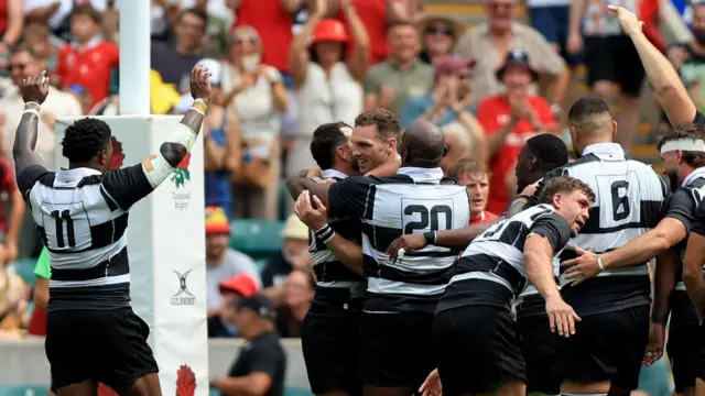 George North hugged after kicking conversion