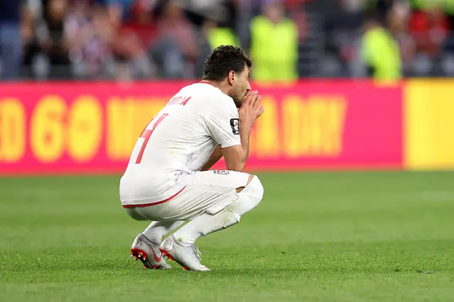 Shoja Khalilzadeh looks dejected at full-time
