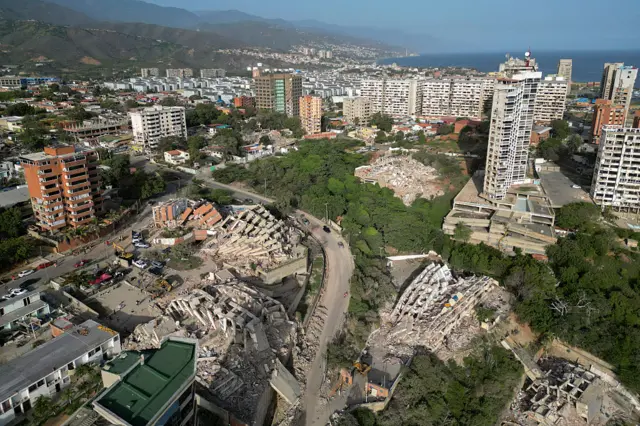 This aerial view shows collapsed buildings in Catia La Mar, La Guaira state, Venezuela, on June 27, 2026, following earthquakes that struck the region