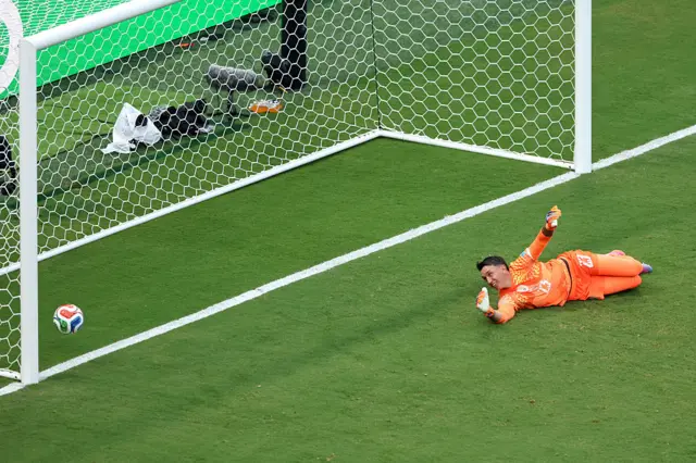Fernando Muslera #23 of Uruguay reacts after conceding the first goal to Alex Baena