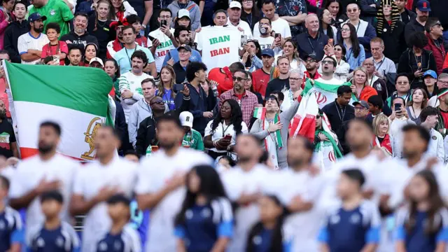 Iran fans as thre national anthem is sang