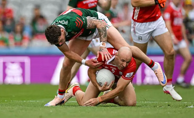 Brian O'Driscoll of Cork in action against Jordan Flynn of Mayo