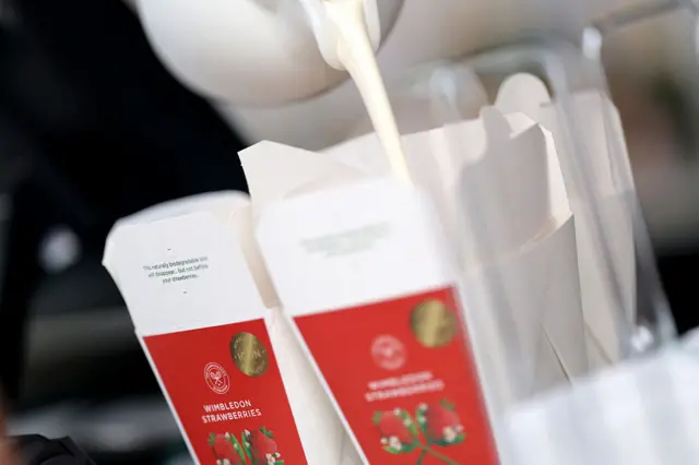 Wimbledon strawberries with cream being poured