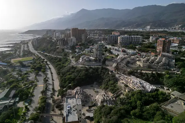 This aerial view shows collapsed buildings in Catia La Mar, La Guaira state, Venezuela, on June 27, 2026, following earthquakes that struck the region