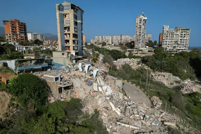 This aerial view shows collapsed buildings in Catia La Mar, La Guaira state, Venezuela, on June 27, 2026, following earthquakes that struck the region