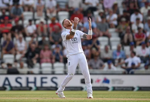 Ben Stokes with his hands in the air