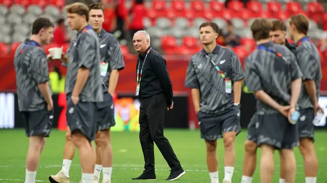 Darren Bazeley and his New Zealand players check out the Vancouver pitch