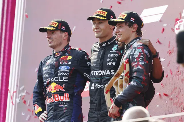Max Verstappen, George Russell and Kimi Antonelli on the podium in Austria