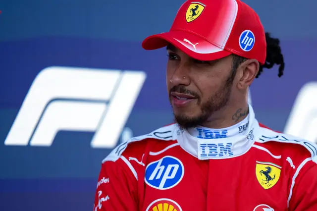 Lewis Hamilton looks on during the post-qualifying interviews at the 2026 Austrian Grand Prix